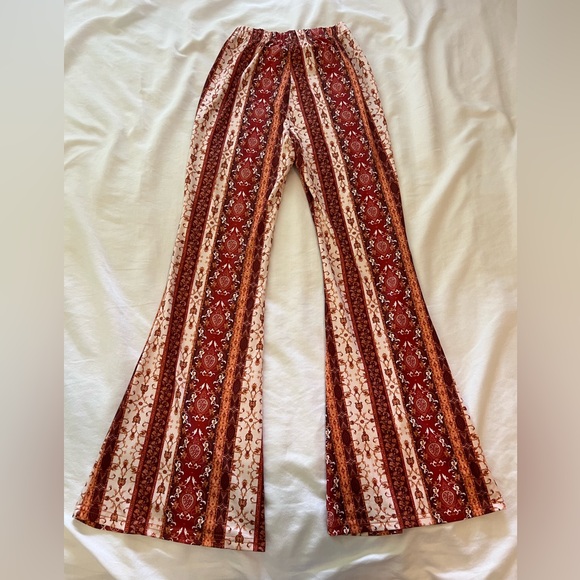 patterned orange/red flare leggings - Picture 3 of 3